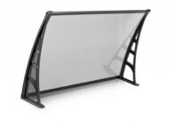 Portable foldable solar panel on a two-legged black stand, angled for optimal sun exposure.